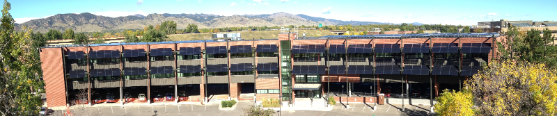 LSX Solar Module System with translucent solar panels provide shade while allowing light in this aerial view of the UCAR building in Boulder, CO.
