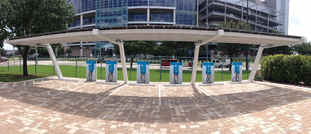 Solar EV charging stations with Solar Carport in the parking lot of NRG Stadium in Houston.