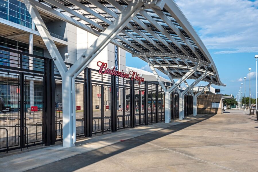 Solar canopy with Lumos Solar LSX Modules in front of ticket entryway to NRG Stadium Budweiser Plaza installed for Super Bowl.