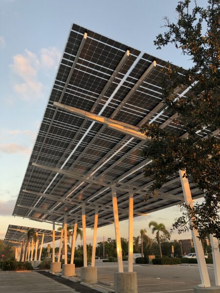 Solar Parking Structures provide shade and solar power in the parking lot of the Naples Zoo in Florida.