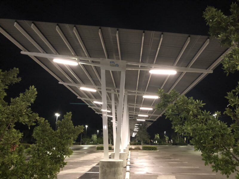 Solar Parking Structures provide shade and solar powered night time lighting in the parking lot of the Naples Zoo in Florida.