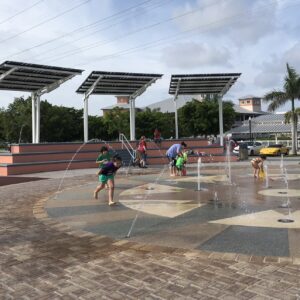 Solarscapes LSX Solar Module System provides shade and solar power for the children playing in the fountains at Laishley Park