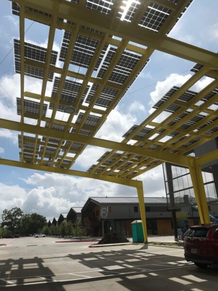 Architectural Solar canopy parking structure covers the Springdale General Artist Space