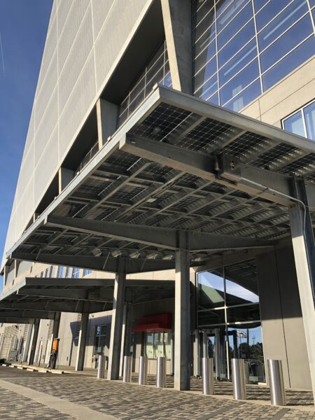 Solar Awnings cover the valet parking area in front of the Mercedes Benz Stadium