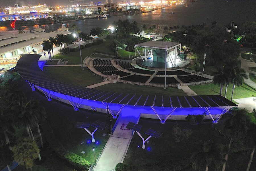 Solar Canopy Structure at night time with LED Lighting covering outdoor walkway at Miami Bayfront Park.