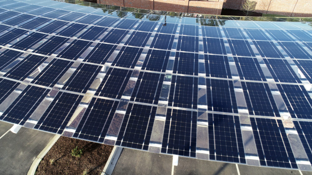 Custom curved solar canopy featuring Lumos LSX solar panels for Marlboro Electric Coop in South Carolina