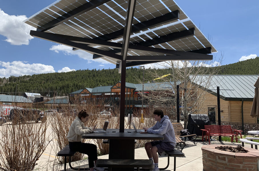Solarzone Solar Charging Table provides shade, mobile and laptop charging, LED Lighting and social distance. The ideal outdoor classroom. 