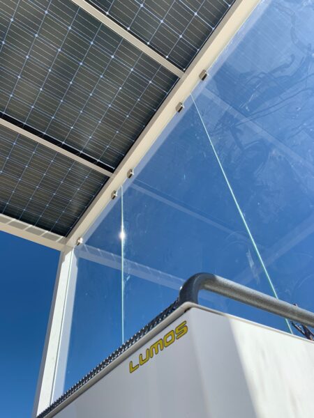 Solar Bus Shelter with beautiful GSX solar panels provide solar power and shade for waiting passengers.