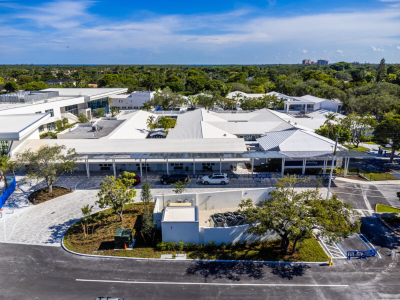 Drone view of Solar Canopy Creating Shade, Protection & Clean Energy at Private School in Florida