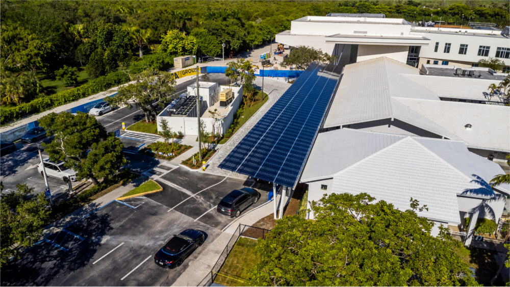 Lumos Solar dream come true canopy to protect student covered in Inclement weather and hot sun of south Florida while creating clean energy!